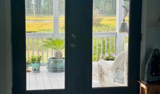 Upper level french doors to sleeping porch.