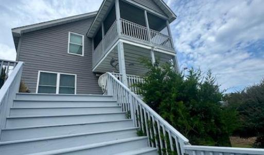 Staircase to ground level deck.