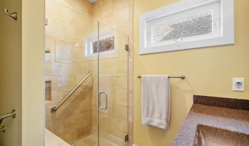First floor primary suite bathroom