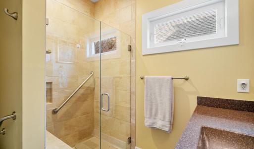 First floor primary suite bathroom