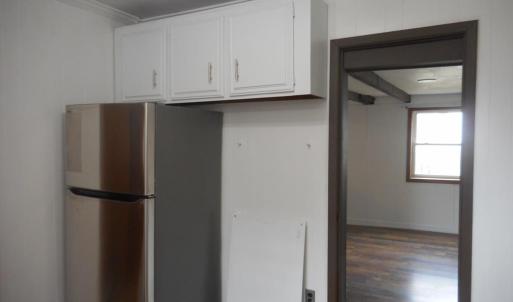 The dining room is easily accessed from kitchen.