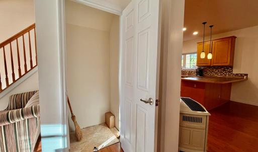 Downstairs Closet w/access, You can access the crawlspace in this closet.  Brilliant!