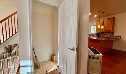 Downstairs Closet w/access, You can access the crawlspace in this closet.  Brilliant!