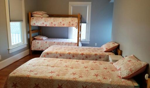 2nd Floor Bedroom, The same bedroom can be set up with 4 separate beds.