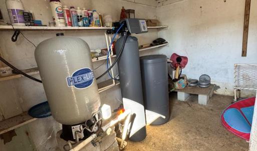 Icehouse interior and well pump equipment