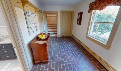 Bonus room connects main house to primary suite