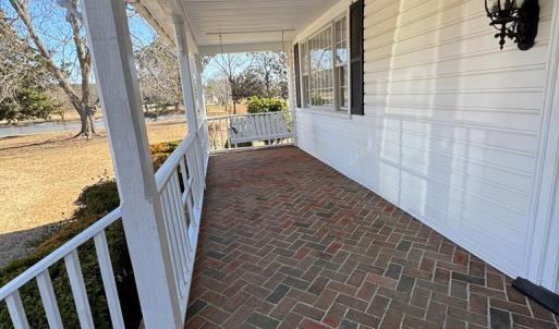 Come on in or linger awhile on the porch swing.