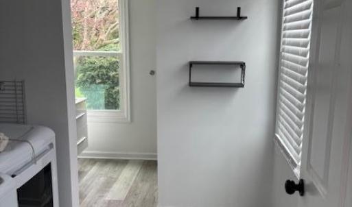 Downstairs laundry room with washer and dryer