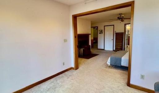 looking from sunroom area to primary bedroom