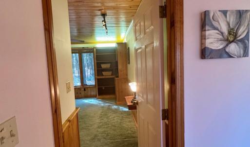 looking from primary bedroom to attached office/de