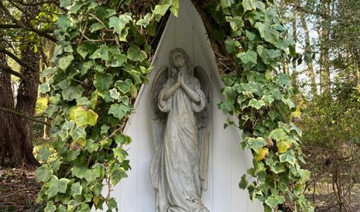 Alcove of ivy and angel
