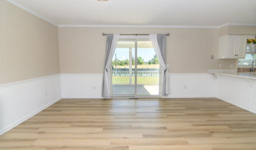 Dinning Area off kitchen with Slider acess to cove