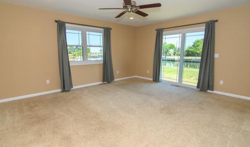 Primary Bedroom with slider access to back yard an