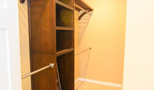 walkin closet in primary bedroom