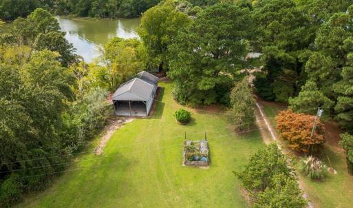 View from above with Barn and open area of yard