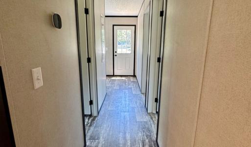 Hallway to 2nd & 3rd bedrooms