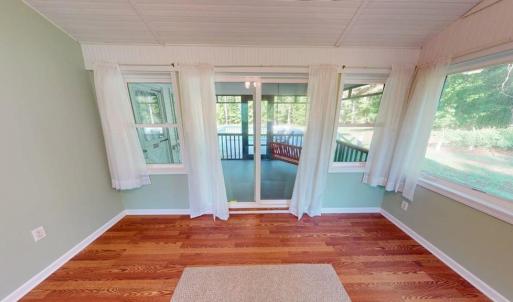 Sunroom leading to screen porch