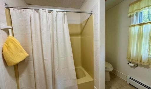 Bath in primary suite wing