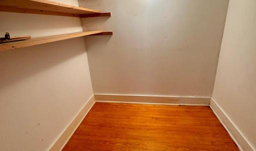1 of 2 walk-in closets in bedroom 4