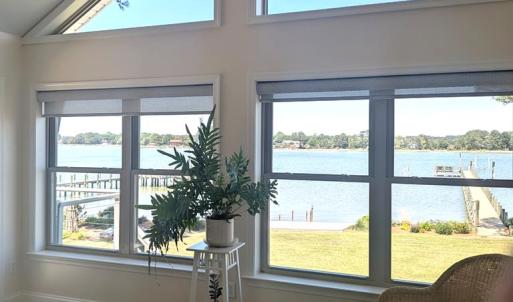 Sunroom, With windows on three sides, plus access to the wrap around deck, heated and cooled with mini split.
