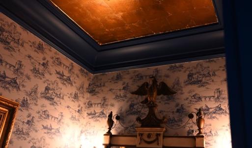 Powder room metallic copper ceiling