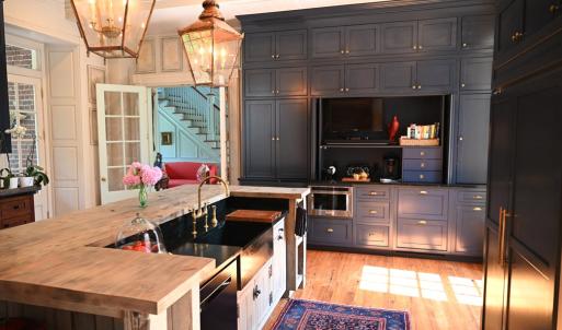 Floor to ceiling cabinetry & soapstone countertop