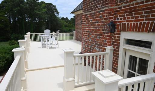 Stairwell entrance and north bedroom deck