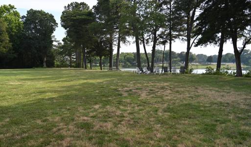 Open yard on shoreline (S view)