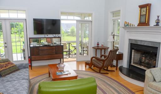Living Room, Vaulted Ceilings, Fireplace and French Doors out the porch