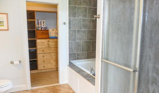 Primary Bath, Walk In Closet through Primary Bath