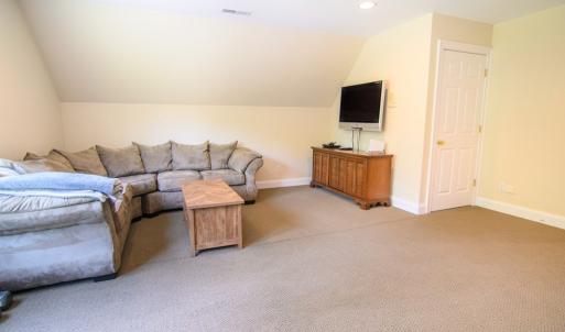 Bonus Room, This room has two entrances, very spacious 26X26 +- and access to spacious attic storage -20.6X13+-