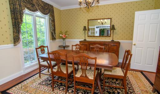 Dining Room, Added Features crown molding and chair rail and french doors from the foyer