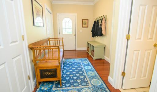 Side Front Entrance, This area leads out to the 2 car garage, laundry room, 1/2 bath, closets and second floor bonus room