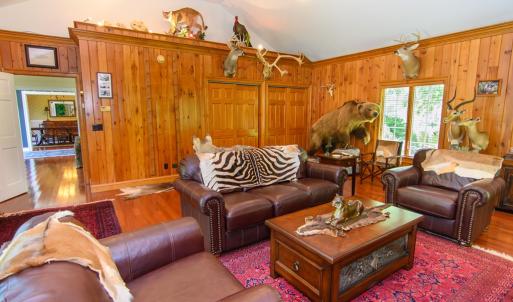 Den, This room is 26X28+- High Ceilings, Storage closets in the back corner.