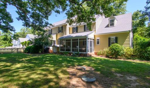 Back, Spacious yard with lovely landscaping.