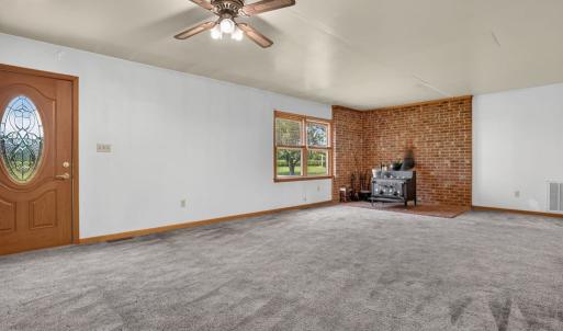 Living room with brick hearth wood stove