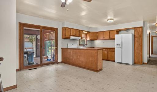 Another view of kitchen to back sun porch