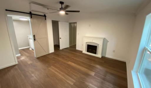 master bedroom with fireplace