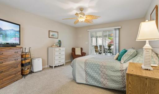 Primary Bedroom with direct access to screened porch