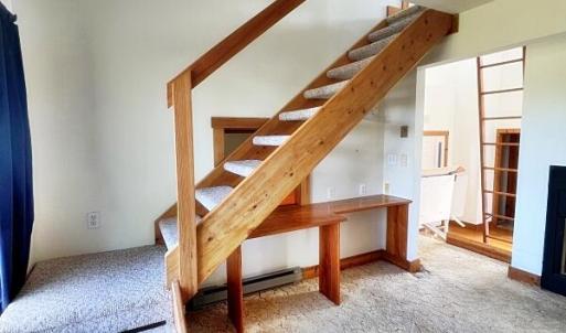 Stairs going up to loft