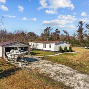 Photo #33 of SOLD property in 27500 US Hwy 264, Engelhard, NC 0.8 acres