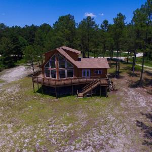 Photo of UNDER CONTRACT!  9 Acres of Waterfront Land with House For Sale in Hyde County NC!