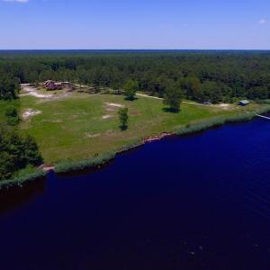 Photo of UNDER CONTRACT!  9 Acres of Waterfront Land with House For Sale in Hyde County NC!