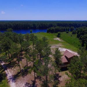 Photo of UNDER CONTRACT!  9 Acres of Waterfront Land with House For Sale in Hyde County NC!