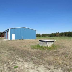 Photo of REDUCED!  14.76 Acres of Farm Land With Shop Buildings For Sale in Columbus County NC!