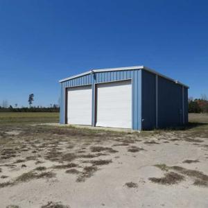 Photo of REDUCED!  14.76 Acres of Farm Land With Shop Buildings For Sale in Columbus County NC!