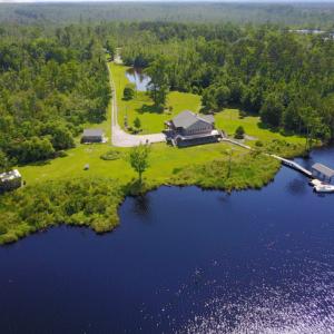 Photo of UNDER CONTRACT!  Waterfront Home with 11 Acres of Land For Sale in Tyrrell County NC!