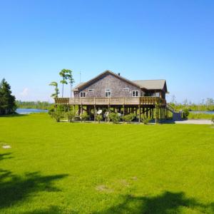 Photo of UNDER CONTRACT!  Waterfront Home with 11 Acres of Land For Sale in Tyrrell County NC!