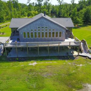 Photo of UNDER CONTRACT!  Waterfront Home with 11 Acres of Land For Sale in Tyrrell County NC!