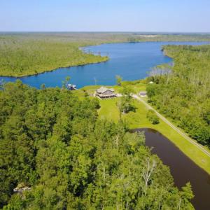 Photo of UNDER CONTRACT!  Waterfront Home with 11 Acres of Land For Sale in Tyrrell County NC!